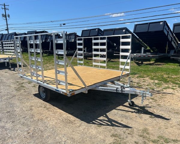 an alcom silver trailer with a wooden deck