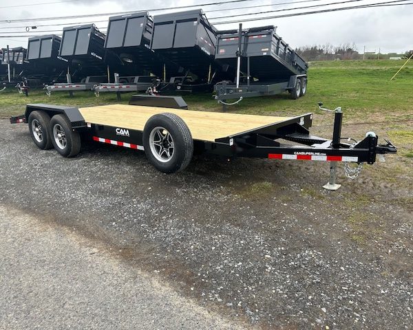 a can trailer is parked on the side of the road